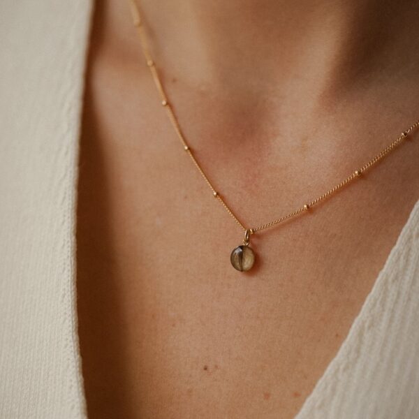 Haarlok ketting goud